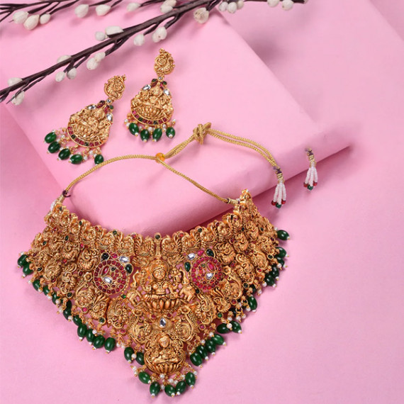 http://631760.leandytrade-hk.tech/products/gold-plated-kemp-stone-studded-lakshmi-design-with-dangling-green-beads-choker-set